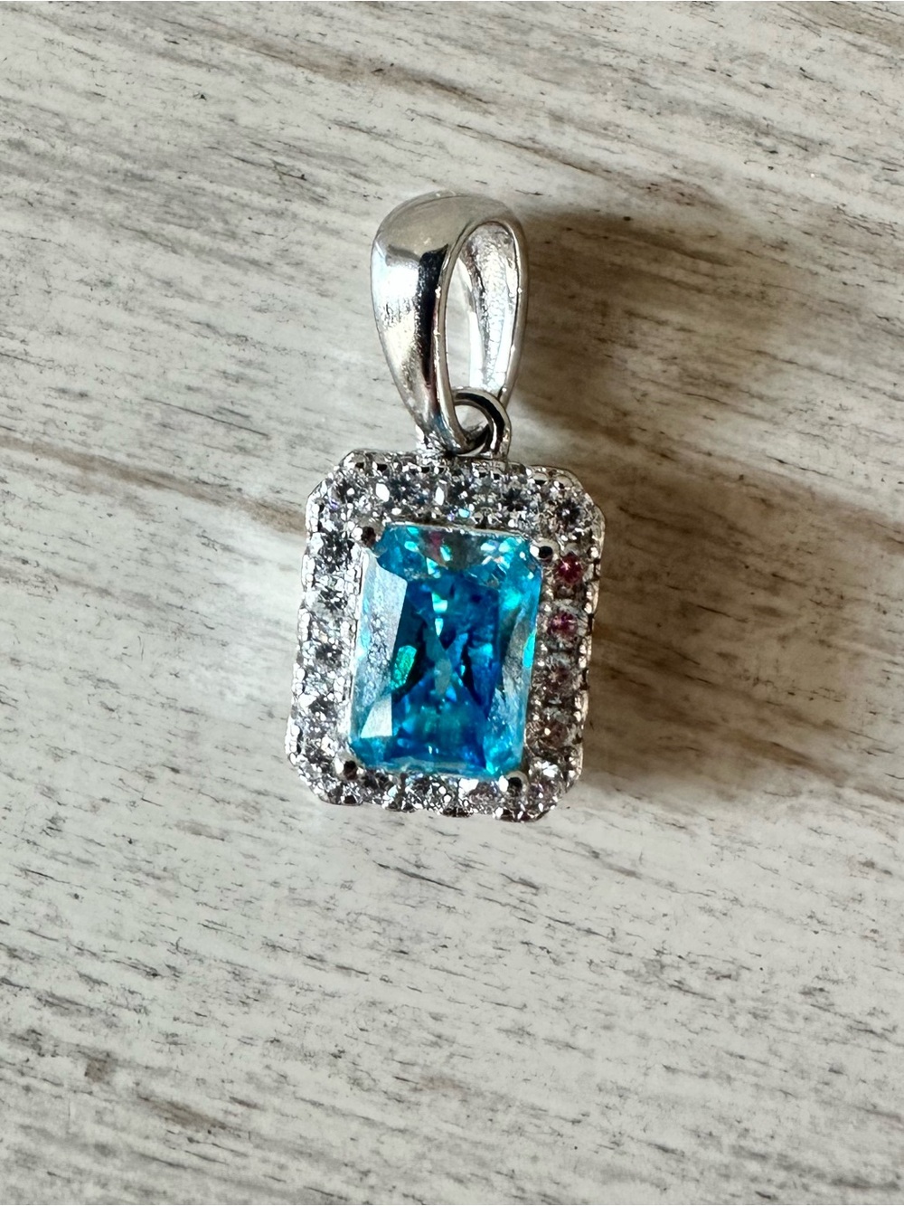 .925 Sterling Silver Pendant with 1.3 Blue Cubic Zirconia Halo